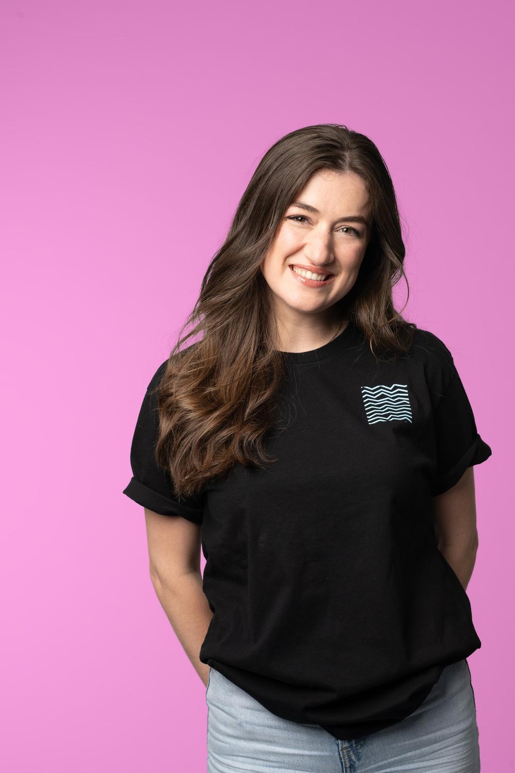 A photo of Aylin with a pink background